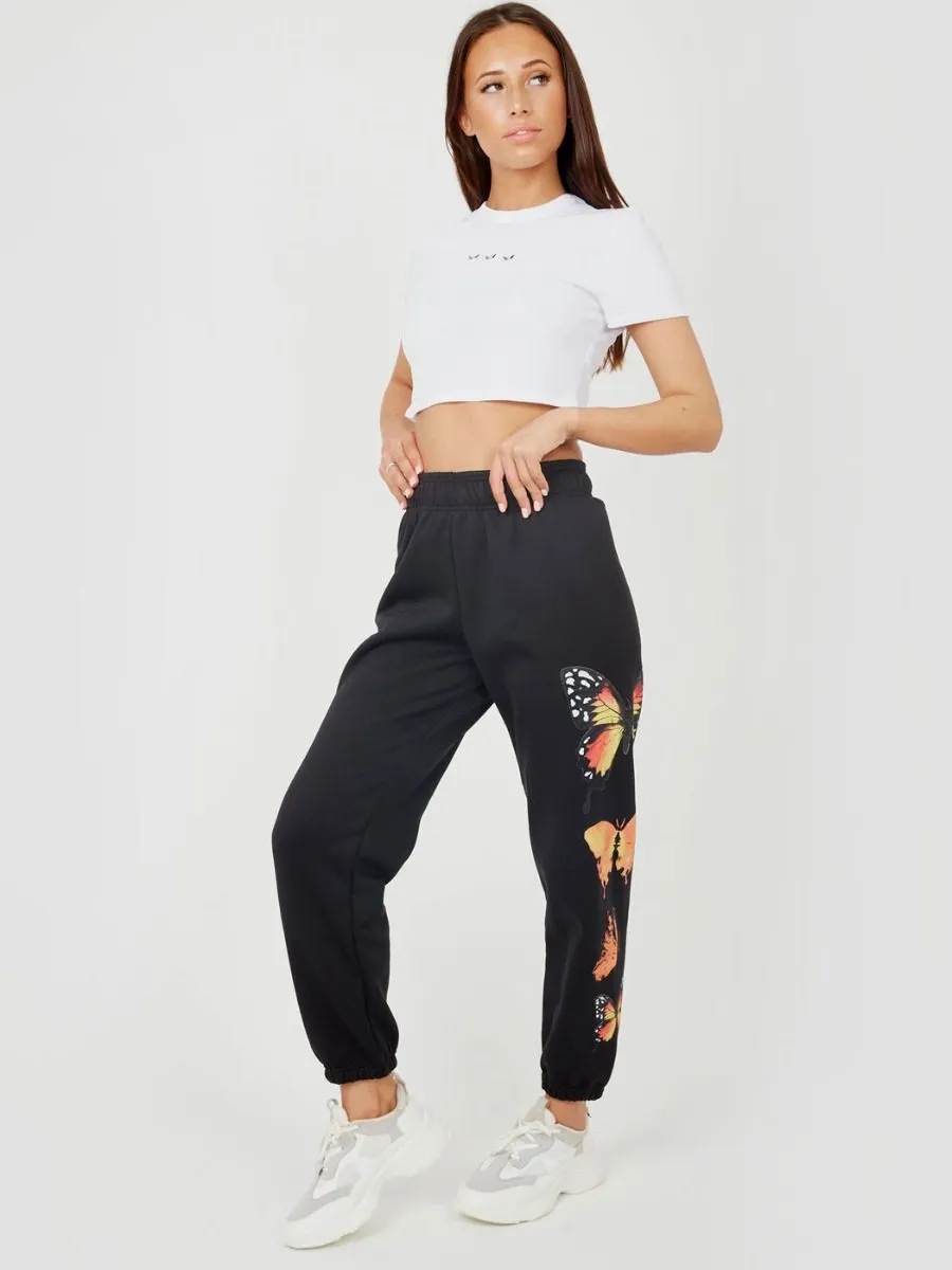 Machela Butterfly Graphic Oversized Fleece Joggers In Black