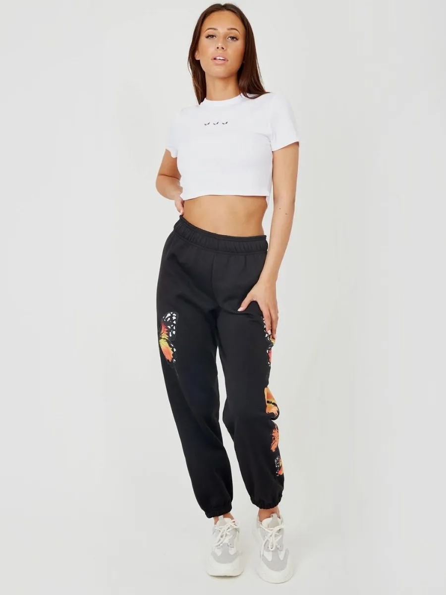 Machela Butterfly Graphic Oversized Fleece Joggers In Black